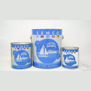 Three cans of Semco Teak Sealer